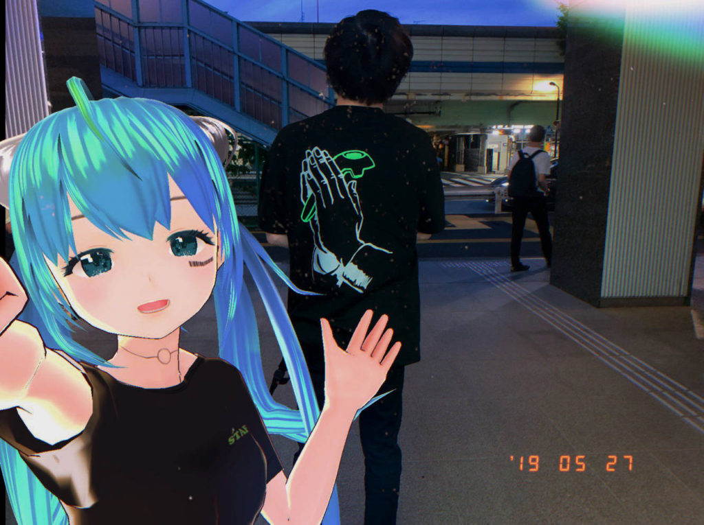 itopoid taking a selfie with someone wearing her PRAY for VIRTUAL T-shirt